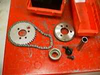 Gears for crankshaft, cam shaft, and balance shaft. Timing chain.